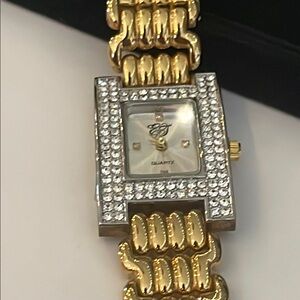 Elizabeth Taylor Gold and Silver Two-Tone Crystal Embellished Watch as in new.